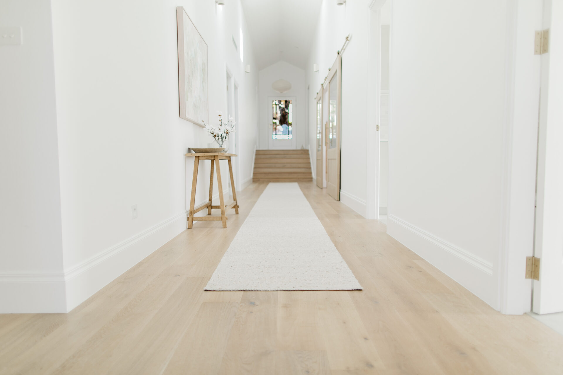 Elegant hallway with polished hardwood floors, Newcastle home